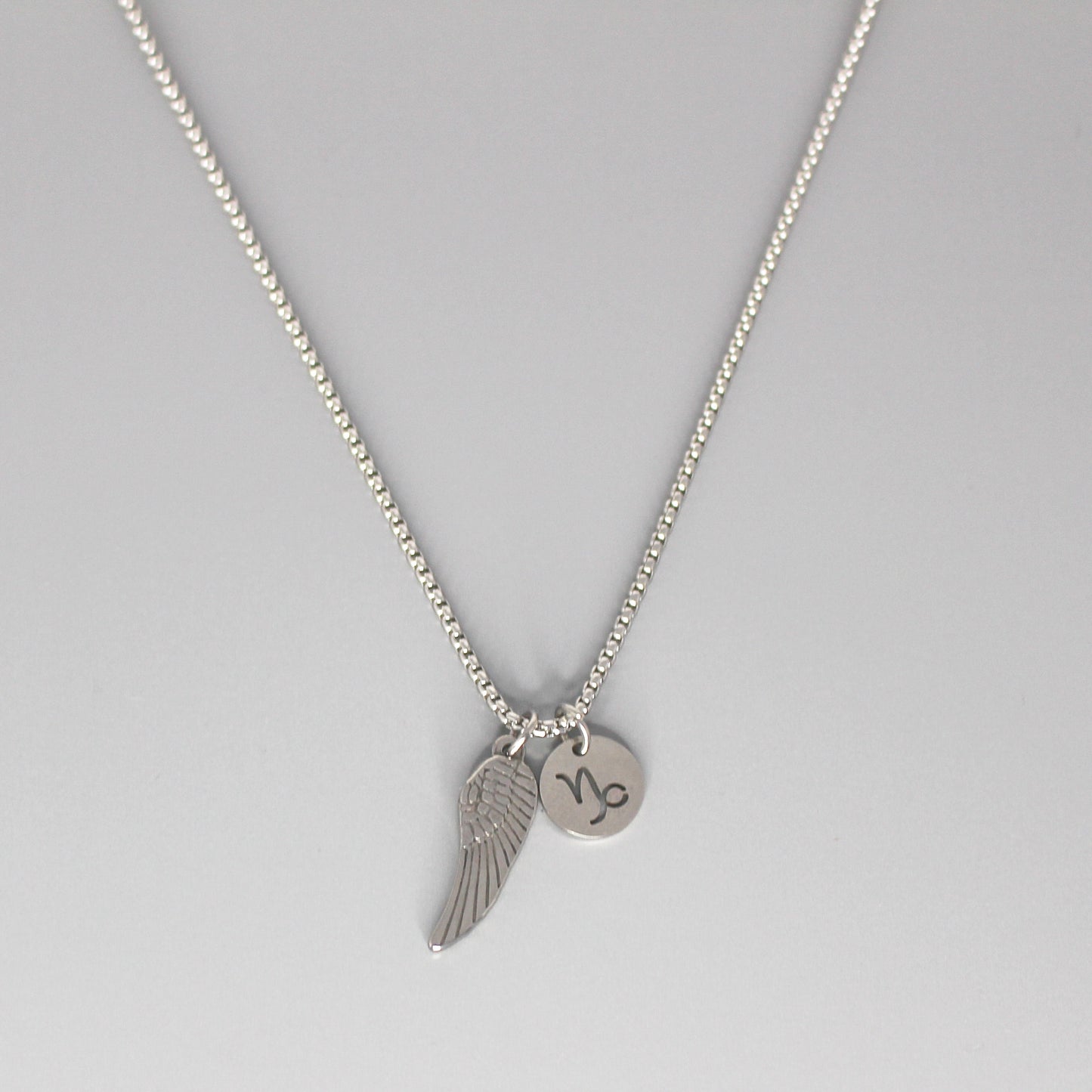 13209 Men’s Zodiac Capricorn with Archangel Wing Double Pendant Necklace