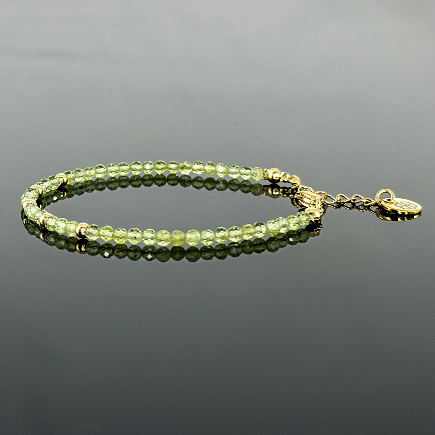 29001 Women’s Minimalist Bracelet with Peridot and Gold Plated