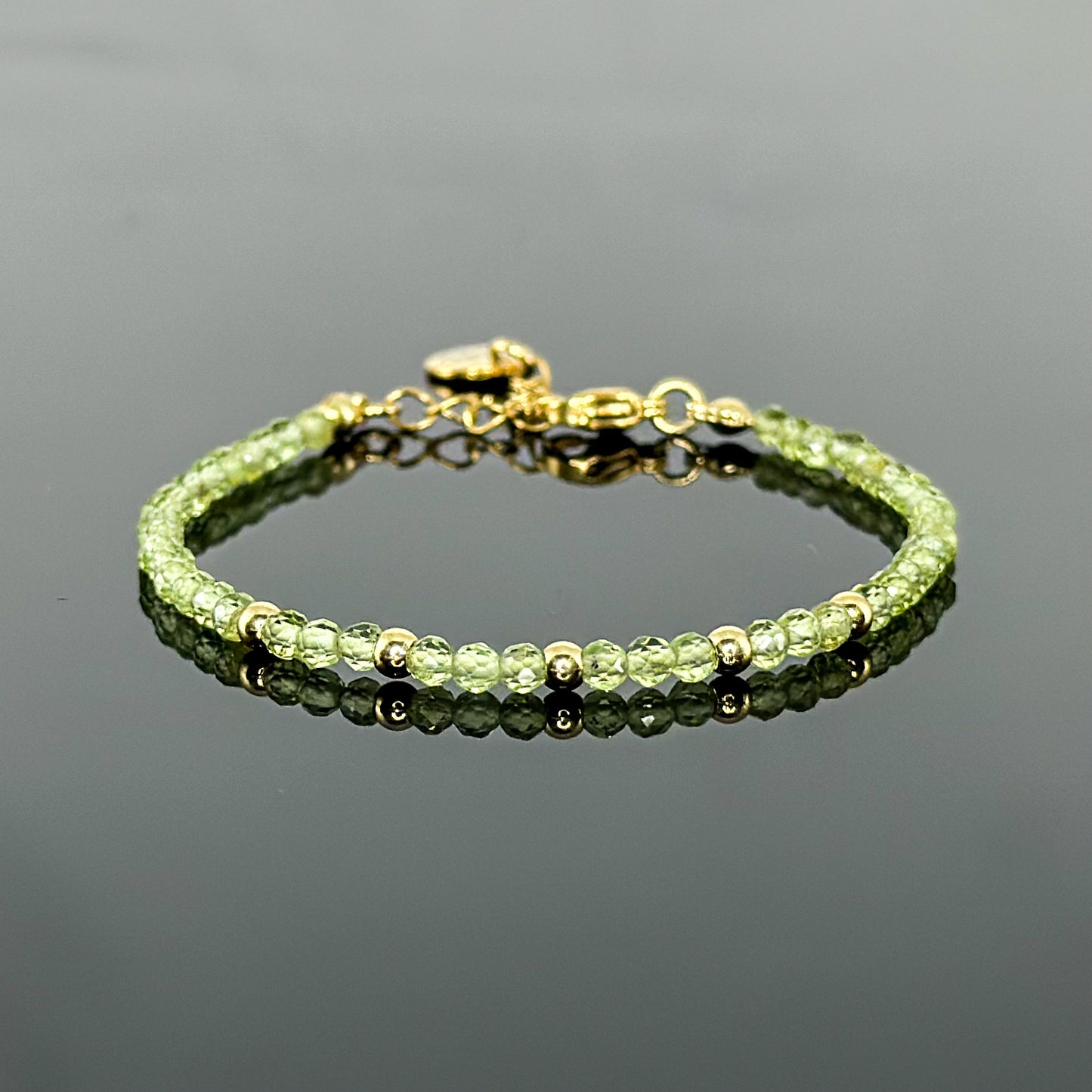 29001 Women’s Minimalist Bracelet with Peridot and Gold Plated